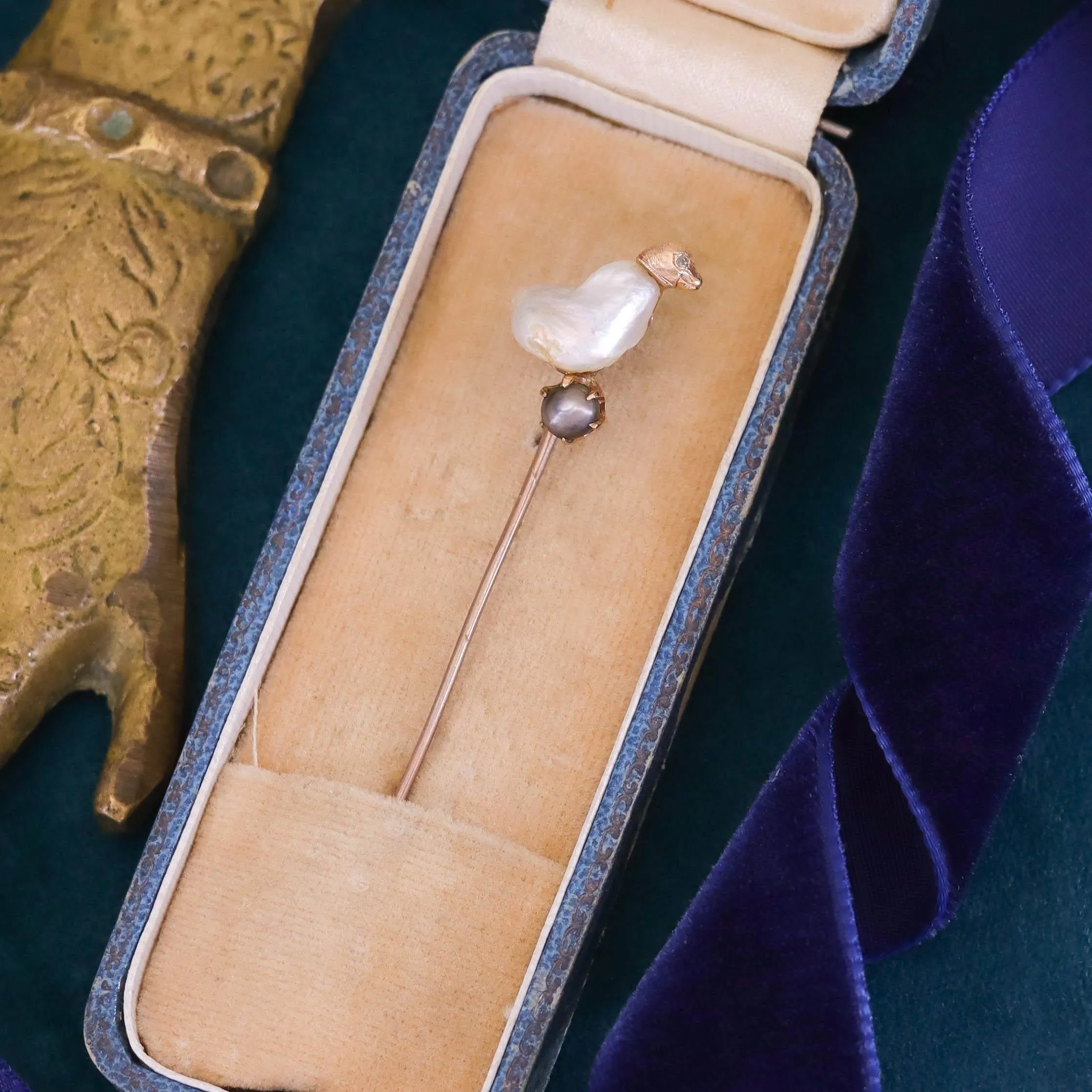Antique Baroque Pearl Chick Stickpin of 10k Gold