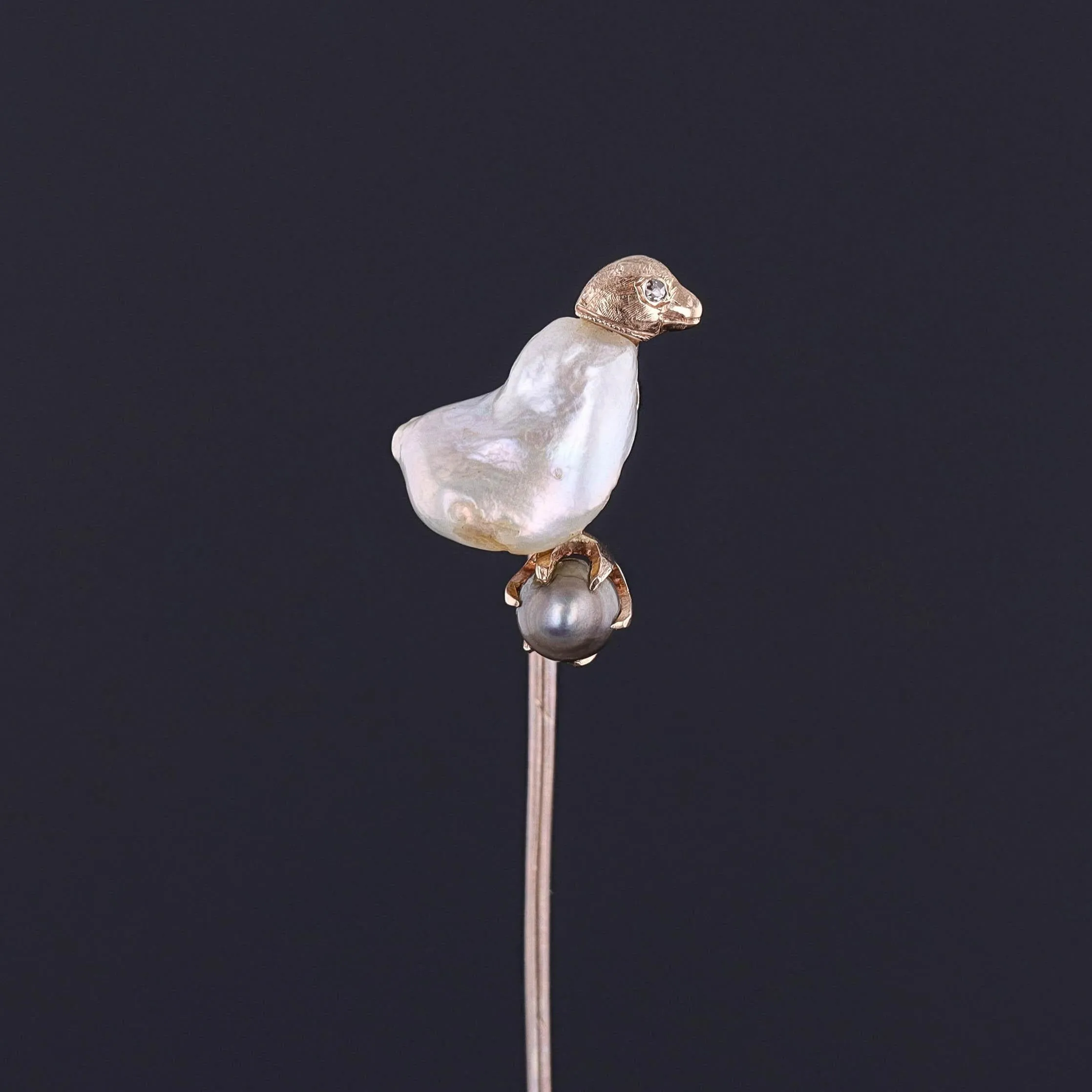 Antique Baroque Pearl Chick Stickpin of 10k Gold