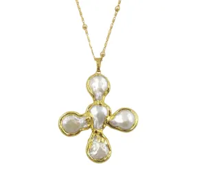 SCULPTURAL CROSS NECKLACE