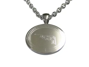 Silver Toned Etched Oval Stealth Bomber Plane Pendant Necklace