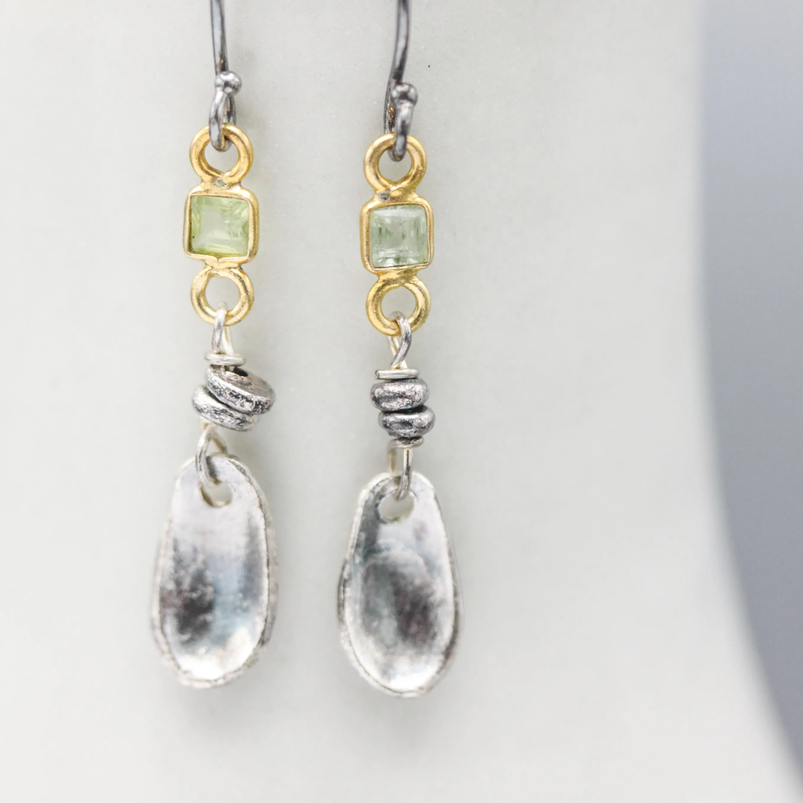 Square green tourmaline earrings in bezel setting with silver leaf on sterling silver hooks style