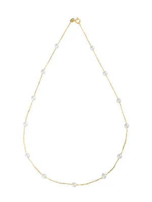 Tin cup with small freshwater pearl necklace in gold